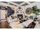 Comfortable living room with a fireplace, plush seating, and hardwood floors at 2404 Fitts Dr, Conyers, GA 30094