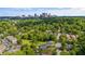 Breathtaking aerial view showcasing the Atlanta skyline and a lush green neighborhood at 925 Hill Se St, Atlanta, GA 30315