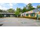 This exterior features vibrant murals and parking spaces, blending artistic expression with commercial convenience for a unique, dynamic space at 925 Hill Se St, Atlanta, GA 30315