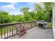 Enjoy outdoor living on this spacious deck with lush greenery and a built-in grill at 925 Hill Se St, Atlanta, GA 30315