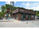 Modern brick building with a corner coffee shop, complemented by outdoor seating and sleek design for a welcoming neighborhood spot at 925 Hill Se St, Atlanta, GA 30315
