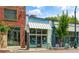Charming storefront with colorful awnings, inviting benches, and large windows, creating an appealing and welcoming neighborhood scene at 925 Hill Se St, Atlanta, GA 30315