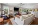 Bright living room featuring hardwood floors, fireplace, and comfortable seating area at 925 Hill Se St, Atlanta, GA 30315