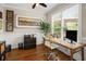 Charming home office with wood floors, natural light, and ample space for productivity at 925 Hill Se St, Atlanta, GA 30315