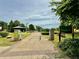 Picturesque view of D.H. Stanton Park with paved paths and lush green landscape at 925 Hill Se St, Atlanta, GA 30315