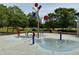 Fun splash pad featuring interactive water elements surrounded by lush trees at 925 Hill Se St, Atlanta, GA 30315