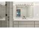 Modern bathroom featuring a glass enclosed shower and sink vanity at 1130 Piedmont Ne Ave # 410, Atlanta, GA 30309