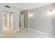 Bright bedroom featuring carpeting, neutral walls, and convenient access to a full bathroom at 1130 Piedmont Ne Ave # 410, Atlanta, GA 30309