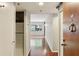 Inviting hallway with hardwood floors leading to a bright living space at 1130 Piedmont Ne Ave # 410, Atlanta, GA 30309