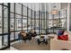 Modern lobby with floor to ceiling windows, comfortable seating, and stylish decor at 1130 Piedmont Ne Ave # 410, Atlanta, GA 30309