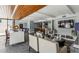 Modern lounge area featuring sleek furniture, a bar counter with seating, and a stylish wood plank ceiling at 1130 Piedmont Ne Ave # 410, Atlanta, GA 30309