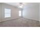 Expansive bedroom with two large windows offering lots of natural light at 185 Windsor Cv, Sandy Springs, GA 30328