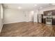 Modern kitchen with stainless steel appliances, granite countertops, and an open floor plan at 1881 Millstream Holw, Conyers, GA 30012