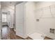 Practical laundry room with washer and dryer hookups and shelving for storage at 1881 Millstream Holw, Conyers, GA 30012