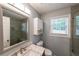 Stylish bathroom featuring a marble vanity, a glass-enclosed shower, and updated fixtures at 2889 Estuary Dr, Acworth, GA 30101