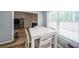 Bright breakfast nook featuring a white table, seating for four, and large windows at 2889 Estuary Dr, Acworth, GA 30101