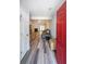 Bright foyer welcomes you with stylish floors, a glimpse of the living area, and fresh paint at 2889 Estuary Dr, Acworth, GA 30101