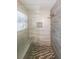 Luxurious walk-in shower with custom tile work, a built-in bench, and a rainfall showerhead at 2889 Estuary Dr, Acworth, GA 30101