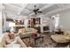 Open-concept living room with coffered ceilings seamlessly connects to the kitchen and dining areas at 320 Wisteria Cir, Roswell, GA 30076