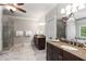 Main bathroom with double vanity sinks, walk-in shower, and soaking tub at 320 Wisteria Cir, Roswell, GA 30076