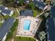 Aerial view of community pool with lounge furniture and well-maintained landscaping at 3301 Henderson Mill Rd # D3, Atlanta, GA 30341