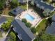 Aerial view of community pool with lounge furniture and well-maintained landscaping at 3301 Henderson Mill Rd # D3, Atlanta, GA 30341