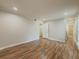 Bedroom with hardwood floors, white trim, and a closet with a white door at 3301 Henderson Mill Rd # D3, Atlanta, GA 30341