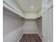 Empty closet with laminate flooring and fresh paint at 3301 Henderson Mill Rd # D3, Atlanta, GA 30341