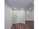 Entryway featuring new wood flooring and white colored walls and trim at 3301 Henderson Mill Rd # D3, Atlanta, GA 30341