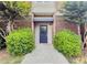 Welcoming front entrance features a solid blue door and manicured landscaping at 3301 Henderson Mill Rd # D3, Atlanta, GA 30341