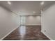Spacious living room with sleek flooring, neutral walls, and recessed lighting at 3301 Henderson Mill Rd # D3, Atlanta, GA 30341