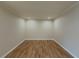 Bright room featuring hardwood floors, crown molding, and recessed lighting at 3301 Henderson Mill Rd # D3, Atlanta, GA 30341