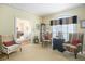 Traditional living room with neutral walls, plush carpet, and an array of comfortable seating at 4066 Brymond Ct, Tucker, GA 30084
