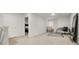 Spacious hallway area featuring neutral carpet and walls, with an office space at the end at 108 Berwick Crossing, Dallas, GA 30157