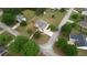 Aerial shot showcasing the home's location within a well-maintained neighborhood with mature trees at 25 Oakbrook Ln, Covington, GA 30016