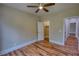Bedroom with vinyl flooring and doorway into closet at 25 Oakbrook Ln, Covington, GA 30016