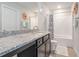 Clean bathroom featuring a granite countertop vanity and a shower-tub combination, providing functionality and style at 3399 In Bloom Way, Auburn, GA 30011
