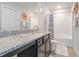 Bathroom features granite countertops, shower and tub combination at 3399 In Bloom Way, Auburn, GA 30011