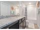 A modern bathroom featuring granite countertops, stylish cabinets and a tub and shower combo at 3399 In Bloom Way, Auburn, GA 30011