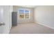 Cozy bedroom featuring modern carpet, window blinds and a closet for storage at 3399 In Bloom Way, Auburn, GA 30011