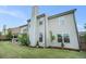 Spacious backyard with lush greenery, a charming pergola, and a well-maintained lawn, perfect for outdoor gatherings at 3399 In Bloom Way, Auburn, GA 30011