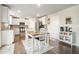Cozy kitchen featuring an eat-in kitchen and a built-in coffee bar area with white cabinets at 3399 In Bloom Way, Auburn, GA 30011