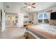 Large bedroom has natural light and neutral tones, plus sitting area making it both serene and inviting at 3399 In Bloom Way, Auburn, GA 30011