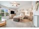 Spacious main bedroom with vaulted ceiling, large window, and neutral tones at 3399 In Bloom Way, Auburn, GA 30011