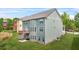 Backyard of home featuring green grass at 1606 Chancery Ln, Lithia Springs, GA 30122