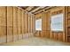 Unfinished basement area featuring framing at 1606 Chancery Ln, Lithia Springs, GA 30122