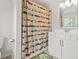 Bathroom with cute car shower curtain and white cabinets at 1606 Chancery Ln, Lithia Springs, GA 30122