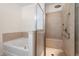 Bathroom features a soaking tub and a separate glass-enclosed shower with a built-in bench at 2061 Grove Field Lane #13, Marietta, GA 30064