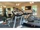 Community fitness center featuring treadmills, weight machines, and TV screens at 2061 Grove Field Lane #13, Marietta, GA 30064