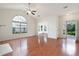 Open living room with views into the sunroom and a door to the backyard at 2061 Grove Field Lane #13, Marietta, GA 30064